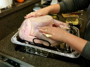 I'm rubbing down my turkey with Ramsay's butter rub. This is going to taste so good!